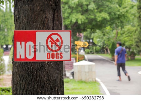 No dogs.No Dogs Allowed On The Grass Area Sign.No dog