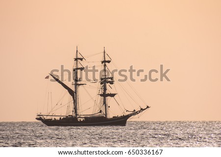 Photo Picture of a Sail Boat Silhouette  at Sunset