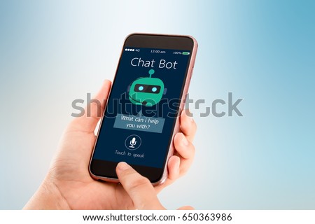 Chat bot concept.Hands holding mobile phone on blurred abstract background Royalty-Free Stock Photo #650363986