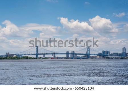 View of the Delaware River and Ben Franklin Bridge in Philadelphia, Pennsylvania.
