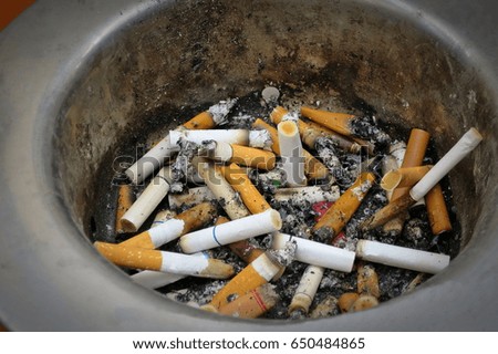 Cigarettes in ashtray . World no tobacco day on may 31. Selective focus. Object ant healthcare concept.
