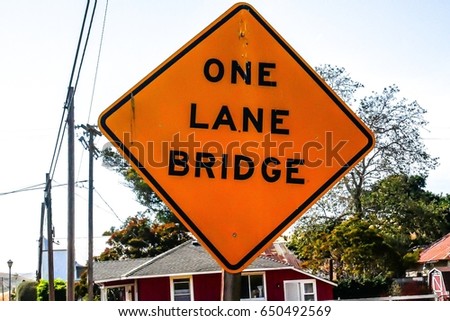 Road sign one lane bridge.