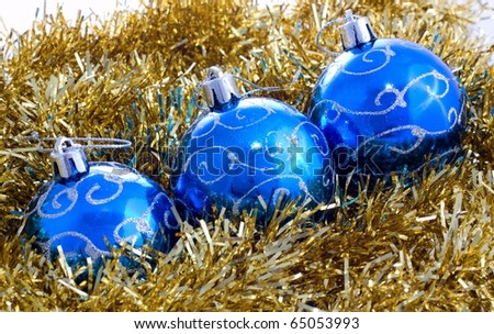 Blue christmas balls with beautiful gold seasonal Christmas decorations on white background