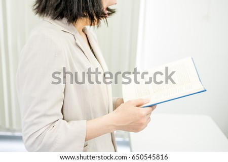 Woman reading aloud