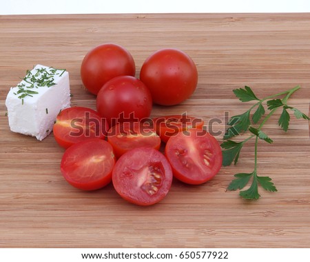 Fresh tomatoes on the shredder