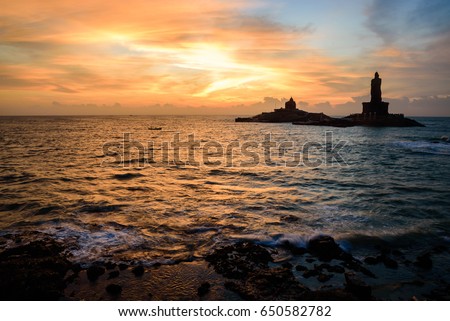One of the iconic monuments in Kanyakumari, the Vivekananda Rock Memorial and Thiruvalluvar Statue is located hundred meters from the shore and is one of the major tourist attractions in Kanyakumari. Royalty-Free Stock Photo #650582782