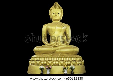 Buddha statue on dark background