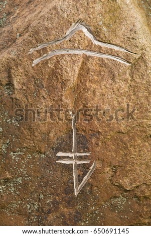 Signs of the zodiac on stone, symbols and runes