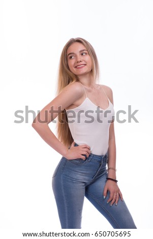 Beautiful young woman posing. Isolated on a white background