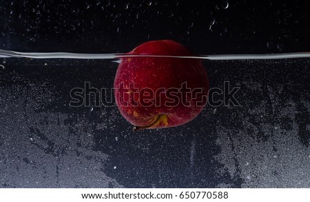 Fruit falling into water