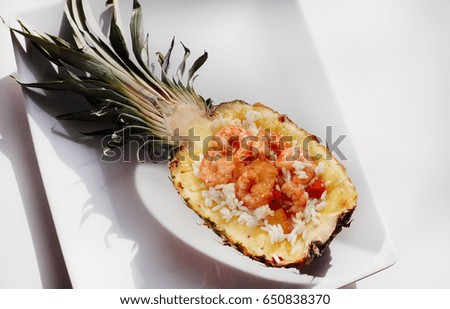 shrimp with rice in pineapple