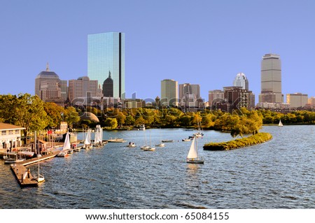 Boston skyline from Cambridge. Sailboats in Charles River, around the Esplanade