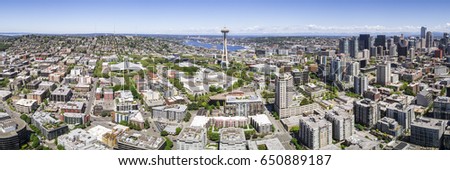 Helicopter Panorama of Downtown Seattle City Skyline with Famous Landmarks and Skyscraper Buildings