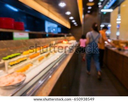 Blur of picture line up food buffet by self service in restaurant