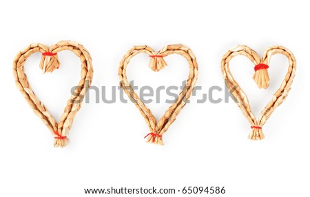 Christmas strawy decorative hearts isolated on white