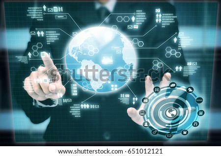 Internet information on futuristic touch screen interface accessed and manipulated by a businessman