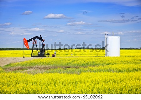 Oil pumpjack or nodding horse pumping unit in Saskatchewan prairies, Canada