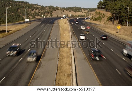 six lanes of blurred traffic Royalty-Free Stock Photo #6510397