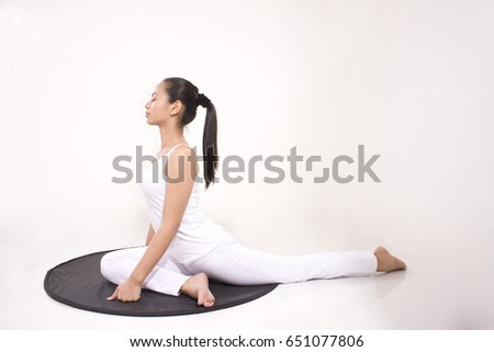 asian woman sport for health with yoga pose virabhadrasana white background