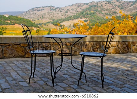 Tables and chairs outside the winery in Napa Valley in Autumn at sunset