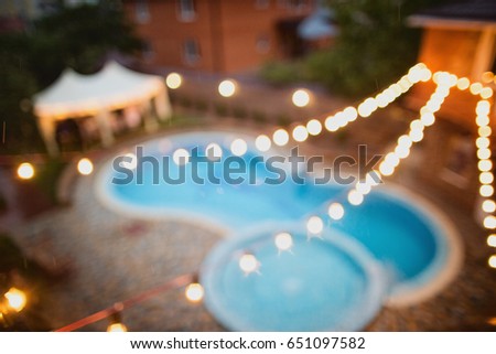 Garland Light bulb near the pool