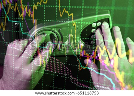 Financial data on a monitor as Finance data concept. Analytics Report Status Information Analysis Chart Graph in digital screen. Business analyzing financial statistics displayed on the screen
