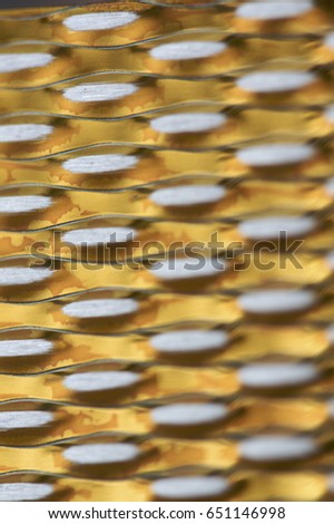 Coloured textured metal surface