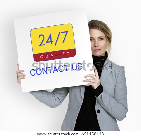 Business person holding 24/7 service banner
