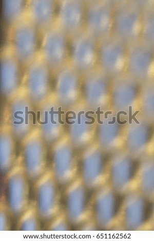 Out of focus coloured textured metal surface