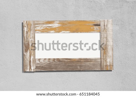 Old vintage wood sign with rough wall background.