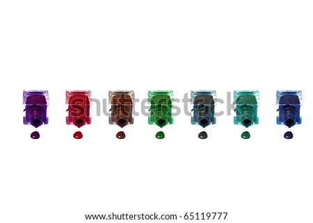 multicolor - violet, red, brown, green, gray, blue, turquoise  nail polish bottles with splatters isolated on white background