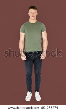 Young adult man smiling casual studio portrait