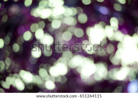 Abstract bokeh blurred purple light for background