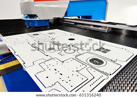 Electro mechanical coordinate punch press with CNC Royalty-Free Stock Photo #651316240