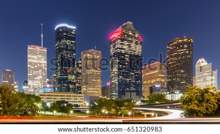 Downtown Houston early in the night with plenty of traffic leaving the city!