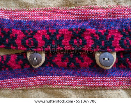 Red fabric texture.Northern Thailand pattern.