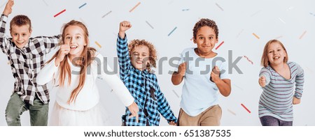 Joyful kids having fun at the school party