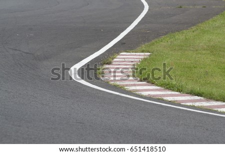 sleek asphalt and danger at the bend of the motorbike track, motoGP