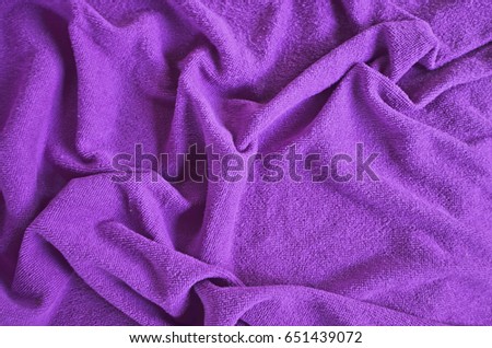Violet pattern of wrinkled towel texture
