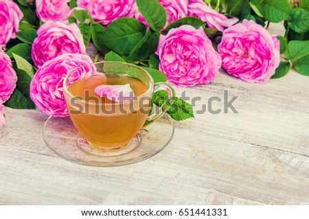 Rose, tea rose on a light background. Tea. Selective focus. 