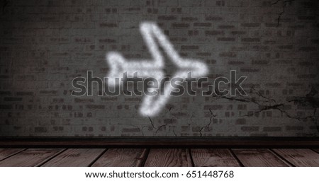 Digital composite of Digital composite image of airplane shape on brick wall