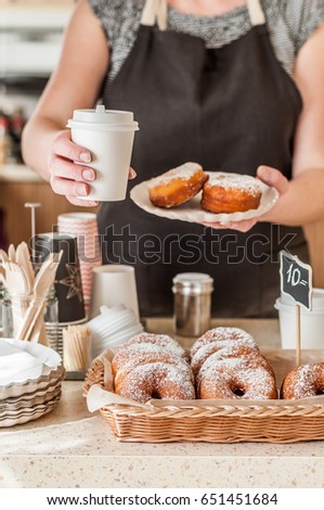 Doughnut Store Counter, Donuts with Icing Sugar in a Display Basket, copy space for your text