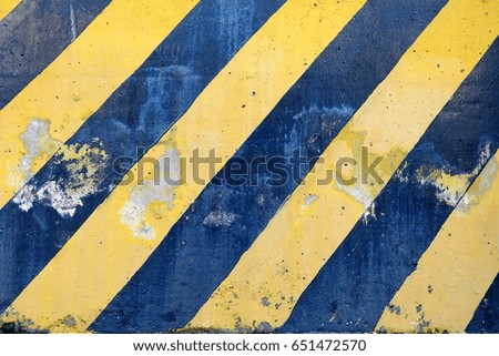 Old Black and Yellow Striped Caution Sign.
