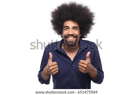 Afro man posing in front of a white background