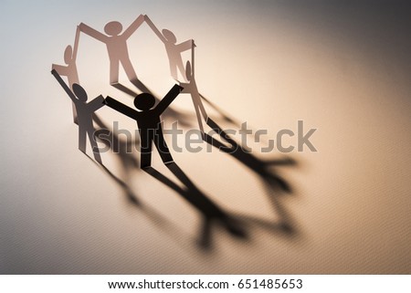 black figure in closed joining of six white paper figure in hand up posture on white background. in concept of business, cooperation and weakness.