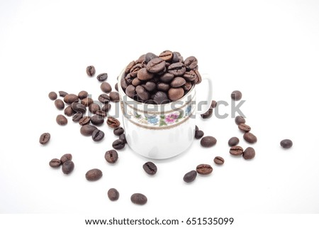 coffee bean On a White background In the glass