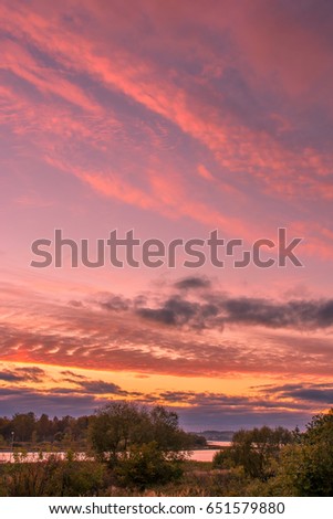 Colorful sunset in autumn. Beautiful clouds, quiet environment.