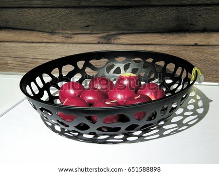 Vase with red apples



