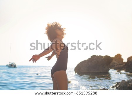 Beautiful woman relaxing at the sea
