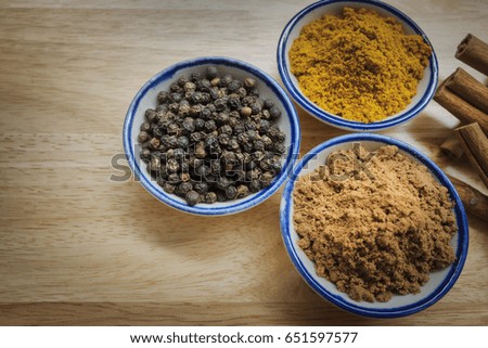 soft focus spice powder in little dish on the table